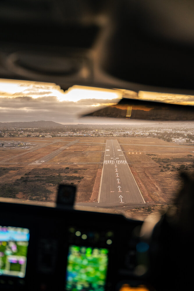 Cockpit view lined up on final approach to a San Diego runway